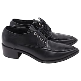 Scarpe Oxford a punta con lacci Chanel in pelle nera