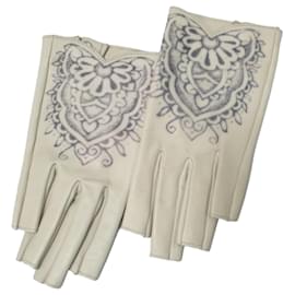 Elegant Chanel Lambskin Fingerless Gloves - Size 7 Pre-owned