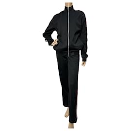 Tuta Givenchy nera con strisce laterali a contrasto Taglia M usata