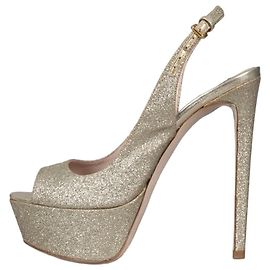 Sandali con tacco a stiletto dorati Miu Miu - Taglia 36 Usati