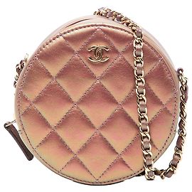 Clutch rotonda in pelle di agnello iridescente viola con catena Chanel