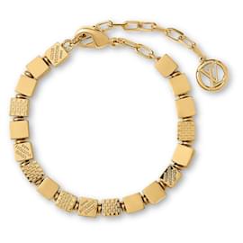 Bracciale Louis Vuitton Cube in metallo dorato