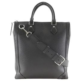 Borsa a mano verticale Taiga Louis Vuitton