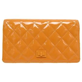 PORTAFOGLIO CHANEL BOY IN PELLE QUILTED PATENT ARANCIONE PORTA MONETE