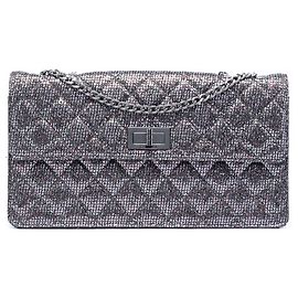 Chanel Matelassé Glitter Toile Reissue 2.55 con solapa