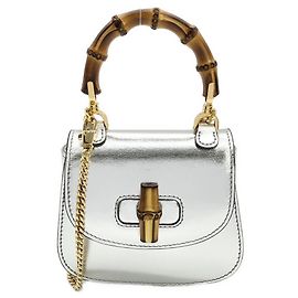 Borsa in pelle laminata Gucci BAMBOO 1947