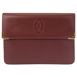 Clutch in pelle Bordeaux Must Line di Cartier