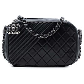 Borsa a tracolla Coco Boy in pelle di agnello trapuntata nera di Chanel