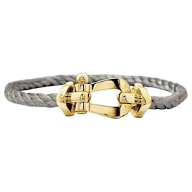 Bracciale Fred, 'Forza 10', oro giallo, acciaio.