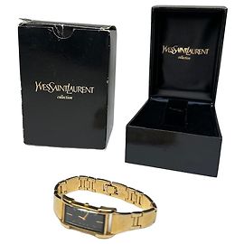 Reloj de cuarzo chapado en oro vintage Yves Saint Laurent