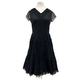 Autre Marque Vestido negro con falda de seda