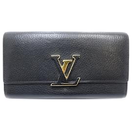 Lange Brieftasche Capucines aus schwarzem Taurillon Louis Vuitton