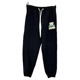 Tuta nera con logo Lacoste x Awake