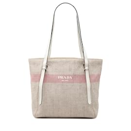 Borsa tote in tela beige con strisce e logo Prada