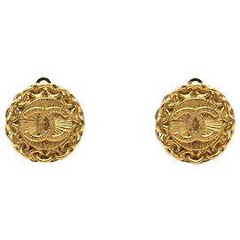 Orecchini rotondi a clip in oro placcato CC dorato di Chanel