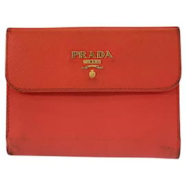 Portafoglio compatto in pelle Prada con logo, hardware dorato arancione