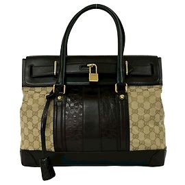 Borsa tote in pelle con stampa coccodrillo GG Canvas di Gucci