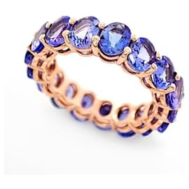 14-karat rose gold eternity ring with 17 oval tanzanites - Autre Marque