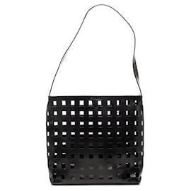 Borsa a spalla in pelle perforata nera Prada