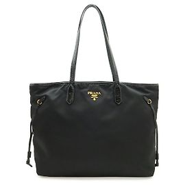 Borsa tote in nylon e pelle verniciata Prada