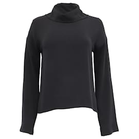 Chanel Knopfbluse aus schwarzer Seide