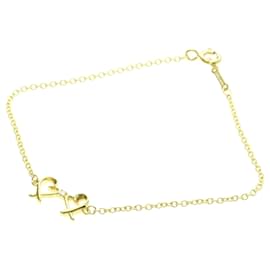 Doppeltes Liebesherz-Armband von Paloma Picasso aus 18K Gelbgold und Diamant von Tiffany & Co.