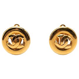 Pendientes redondos de clip en oro dorado CC de Chanel