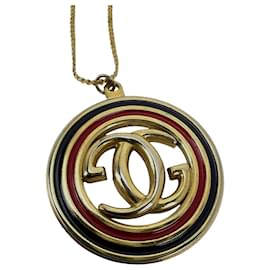 Collana vintage in tono oro con pendente G intrecciato Gucci