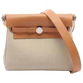 Herbag Zip 20 in Tela Militare Marrone e Vacca Hunter di Hermès