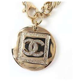 Collana Choker in metallo dorato Chanel con marchio Coco e strass