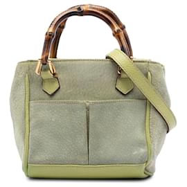 Borsa in suede verde Gucci con manico in bambù