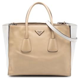 Borsa Prada beige bicolore in pelle lucida con doppia tasca e doppio manico