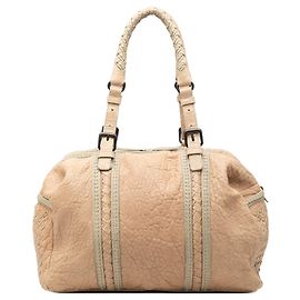Borsa a mano in pelle di agnello beige con rifiniture Intrecciato di Bottega Veneta