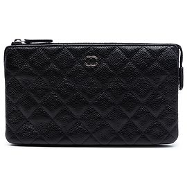 Bolso de cremallera en caviar acolchado negro CC pequeño de Chanel
