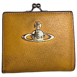 Cartera de cuero vintage Vivienne Westwood Orb con cierre de beso mostaza