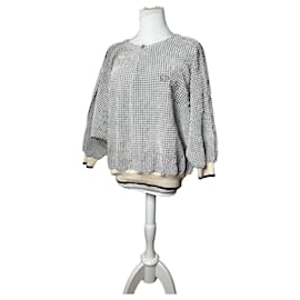 Suéter vintage Dior Sports con logo CD texturizado a cuadros crema y negro M