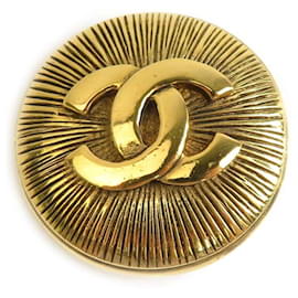 Spilla in metallo dorato Chanel