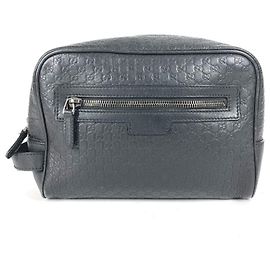 Borsa Clutch Gucci Guccissima con logo GG