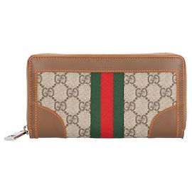 Carteira com zíper Gucci em lona GG Supreme