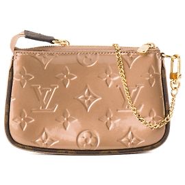 LOUIS VUITTON - Pochette accessori Louis Vuitton in pelle verniciata dorata metallica