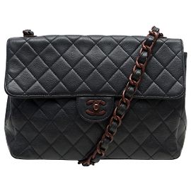 BORSA A MANO CHANEL TIMELESS JUMBO IN PELLE CAVIAR VINTAGE CON CATENA AMBRA