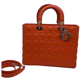 Bolso Dior Duchess de ante naranja con cierres dorados