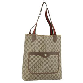 Borsa tote in PVC beige e rosso della linea Sherry GG Supreme di GUCCI 39 02 003 Auth 176694