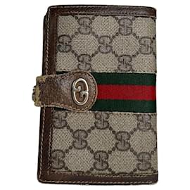Cartera vintage de lona monograma GG de Gucci marrón