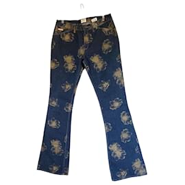 Jeans acampanados Calvin Klein con estampado floral - Autre Marque