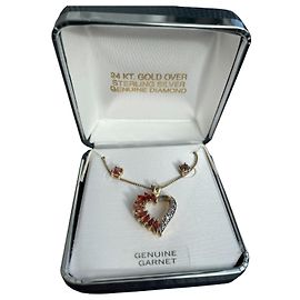Autre Marque Collana pendente a forma di cuore vintage Ross Simons con granati e diamanti