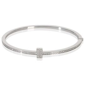 Tiffany & Co Bracciale a cerniera stretto Tiffany T in oro bianco e diamanti Tiffany