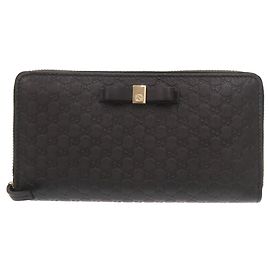 Monedero de cuero negro Microguccissima de Gucci