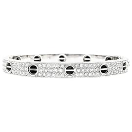 Bracciale Cartier, 'Love', oro bianco, diamanti e ceramica.