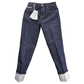Gucci Jeans in denim selvedge con logo ricamato